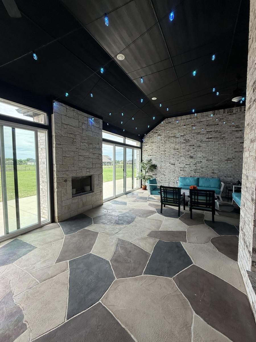 Patio enclosure interior with stone fireplace